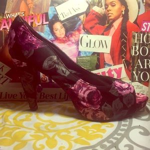 Black peep toe heels with purple and gray roses.